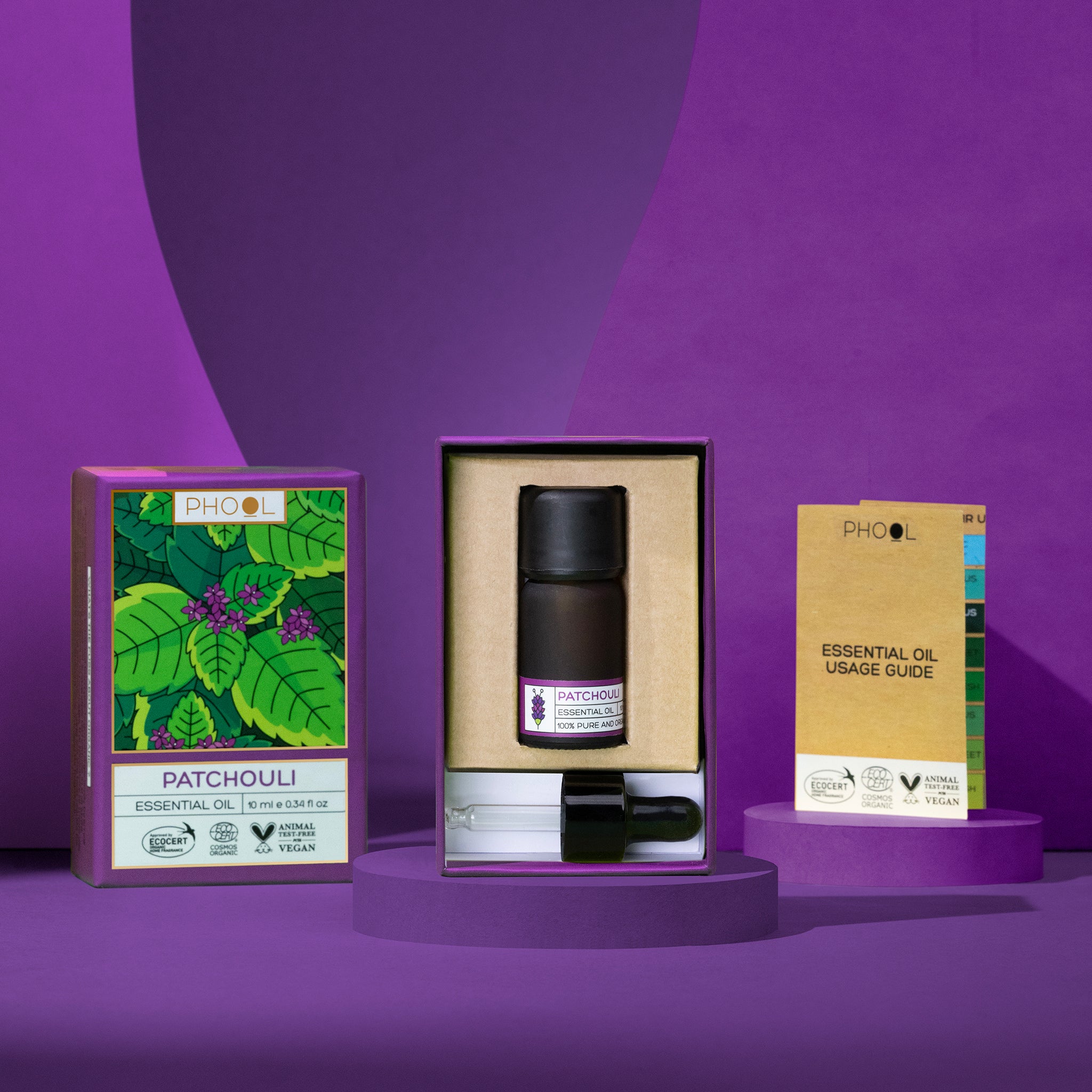 Patchouli essential oil set with packaging and usage guide on a purple background