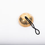 MSY Hanging Himalayan Singing Bowl on a white background, sitting face down.