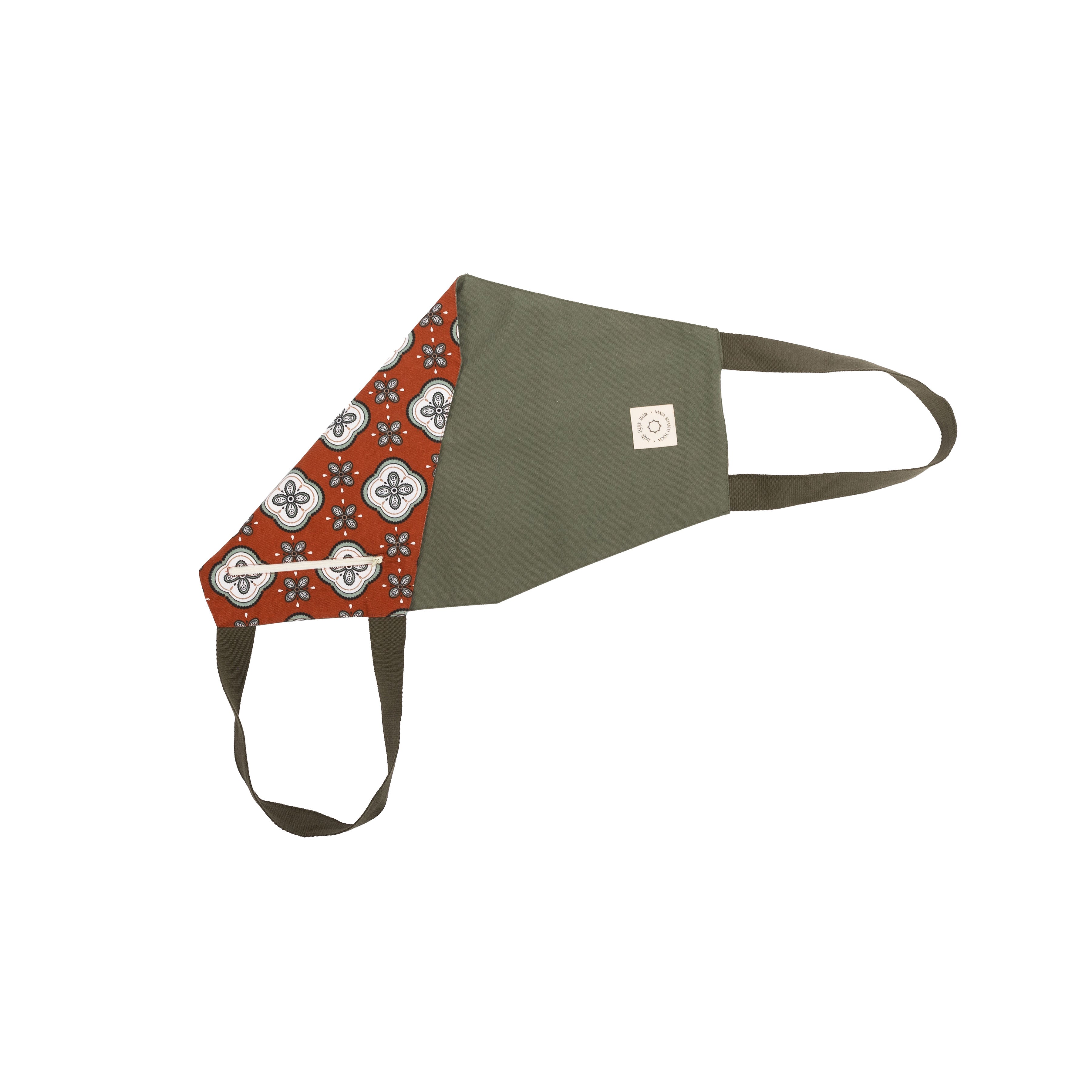 Maya Shanti Yoga Mat Baguette in a green textured fabric with red and white floral pattern on the inside, on a white background.