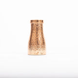 Maya Shanti Yoga 950ml Hammered Copper Carafe on a white background.