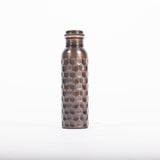 Maya Shanti Yoga Brown Antique 750ml Copper Water Bottle with lid screwed on, on a white background.