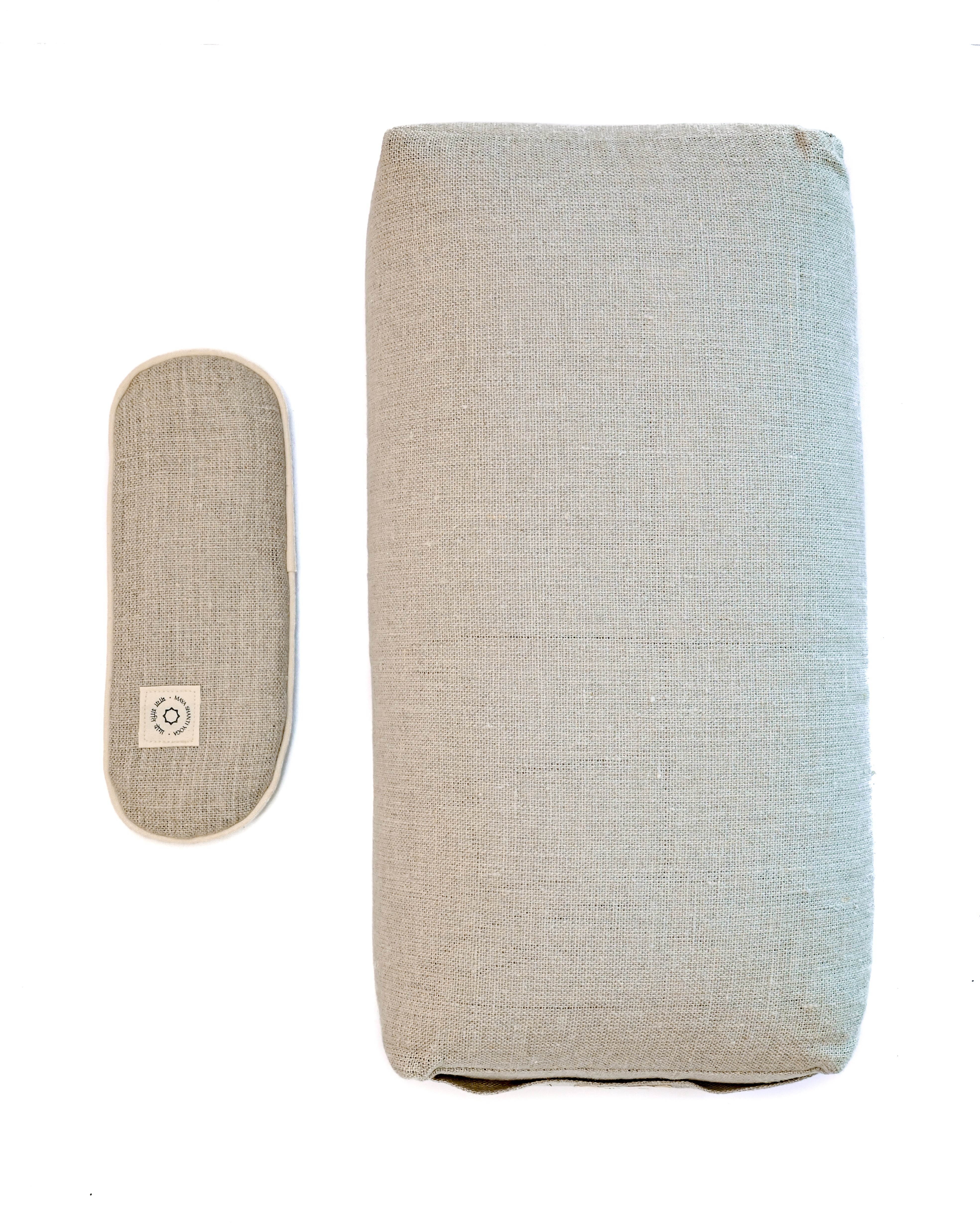An MSY Unwinding Bundle pillow on a white surface.