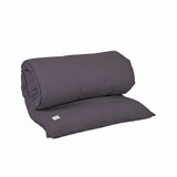 Folded anthracite grey MSY Shiatsu Mat with a tag on a white background