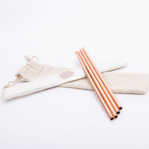 4 MSY Copper Straws with white covers and a cream cotton carrying pouch on a white background.