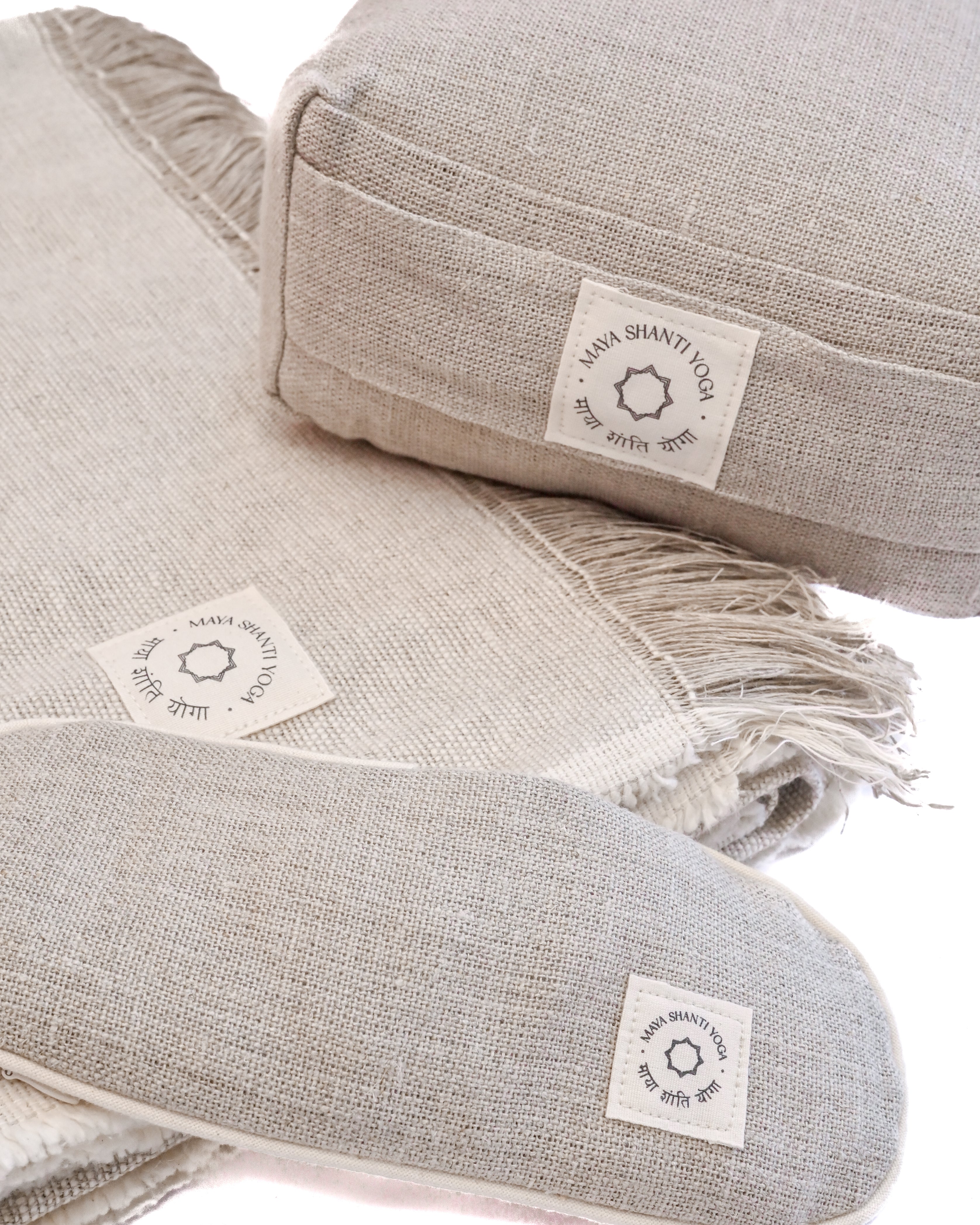 A set of MSY Meditation Starter Bundles from Maya Shanti Yoga in a natural hemp colour, perfect for enhancing mindfulness and meditation practices on a white background.